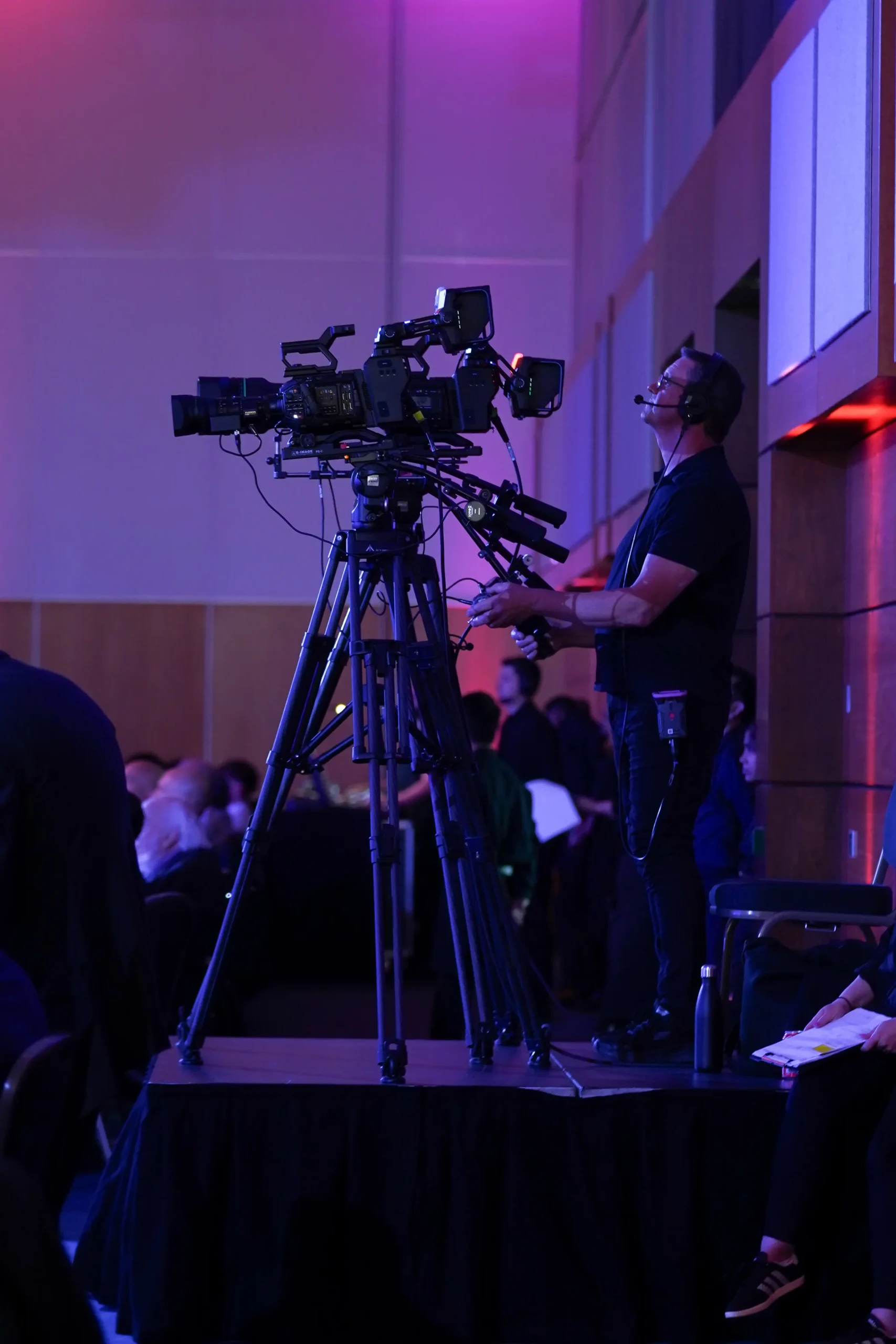 Camera operator filming the NFRC Roofing Awards ceremony
